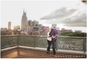 Melanie Grady wedding photography - Nashville engagement photography, Centennial Park, Pedestrian bridge, award winning Nashville wedding photographer, the best photographer in nashville, I Believe in Nashville sign, downtown skyline