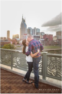 Melanie Grady wedding photography - Nashville engagement photography, Centennial Park, Pedestrian bridge, award winning Nashville wedding photographer, the best photographer in nashville, I Believe in Nashville sign, downtown skyline