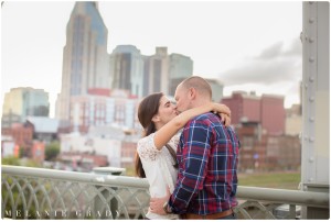 Melanie Grady wedding photography - Nashville engagement photography, Centennial Park, Pedestrian bridge, award winning Nashville wedding photographer, the best photographer in nashville, I Believe in Nashville sign, downtown skyline