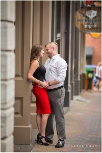 the best nashville engagement photographer, Melanie Grady nashville wedding photographer, downtown nashville engagement photography, she said yes, red skirt, red lips, red and black engagement session, rooftop bar