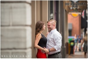 the best nashville engagement photographer, Melanie Grady nashville wedding photographer, downtown nashville engagement photography, she said yes, red skirt, red lips, red and black engagement session, rooftop bar