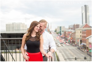 the best nashville engagement photographer, Melanie Grady nashville wedding photographer, downtown nashville engagement photography, she said yes, red skirt, red lips, red and black engagement session, rooftop bar