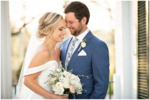 Megan and Cody enjoying a sweet embrace on their wedding day at Riverwood Mansion with Melanie Dunn capturing every moment.