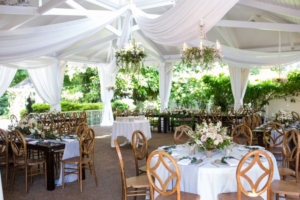 The extra large white gazebo at the garden wedding venue, CJ's off the Square in Franklin, TN is a timeless and beautiful setting for an intimate wedding. 