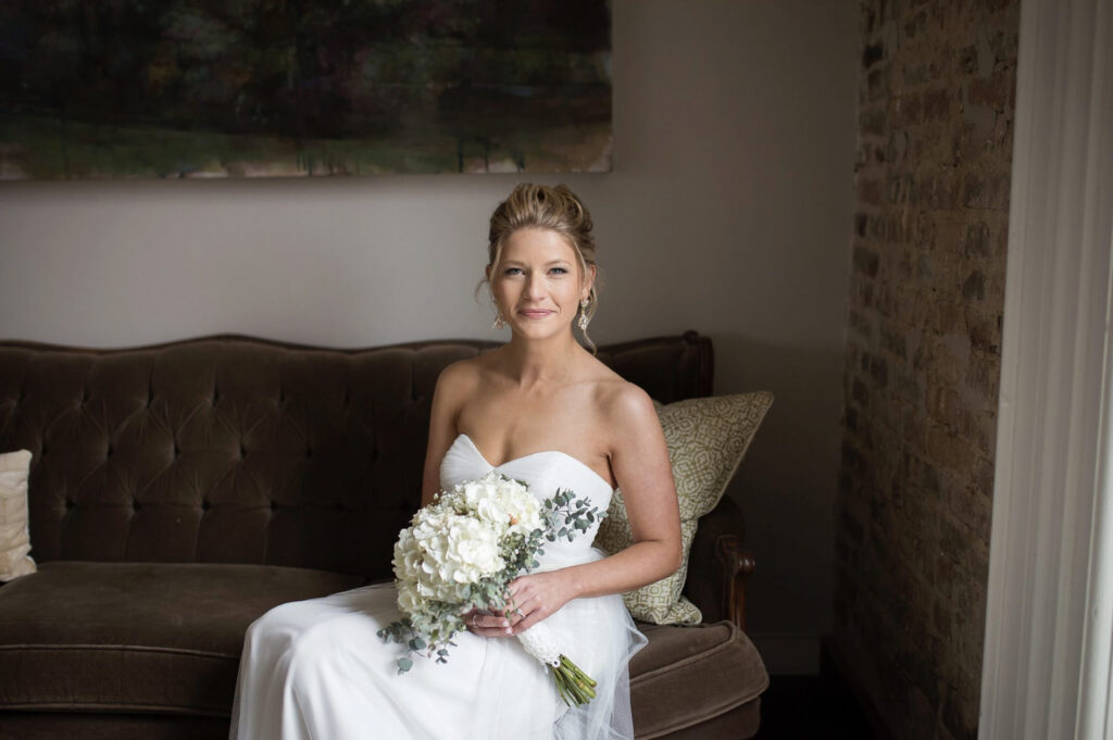 The bridal suite at the Cordelle is elegant and spacious and has beautiful natural light which is perfect for bridal portraits like this one.